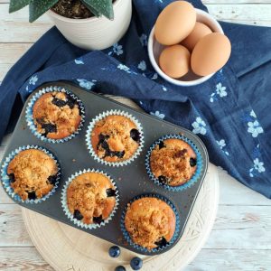 Gluten Free Blueberry Crumble Muffins presented still in baking tray