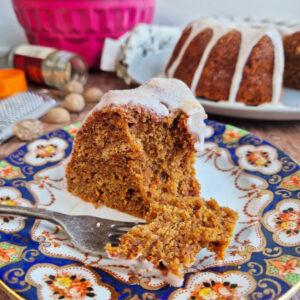 Persimmon Cake - Slice of Sharon Fruit Cake on tea plate with dessert fork